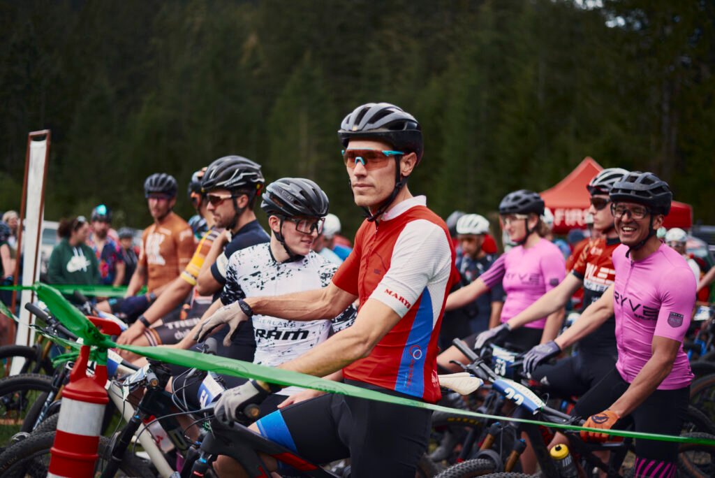 The Elite Men are lined up at the start for the 2024 OBRA State Championships at Silver Falls XC